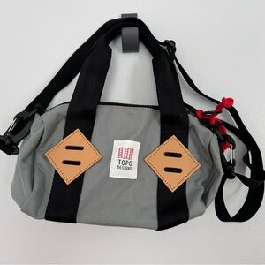 Topo Designs Gray Duffel with Black Straps and Tan Accents